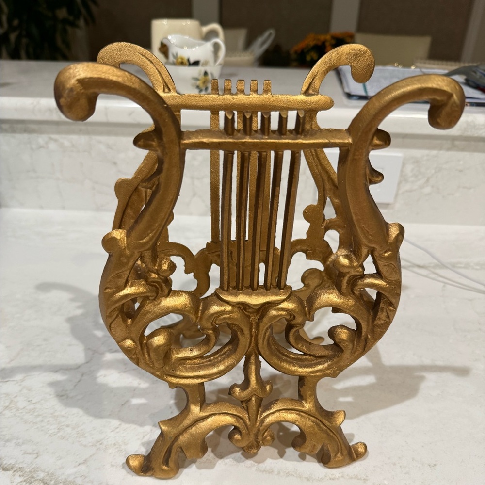 Viny-style lyre harp, commonly utilized as a magazine holder, bookstand,